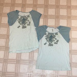Two Patagonia Capilene tshirts women’s Large .